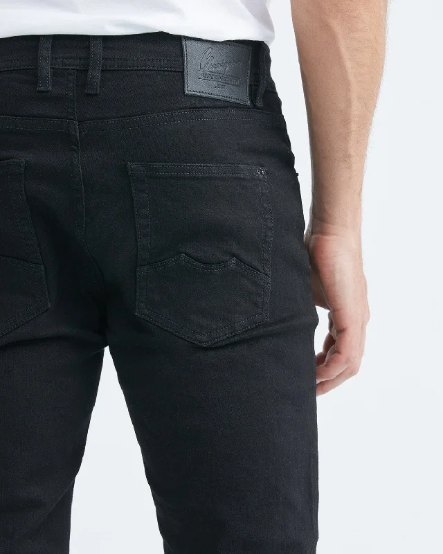 STRAIGHT FIT MID-RISE DARK JEANS IN BLACK