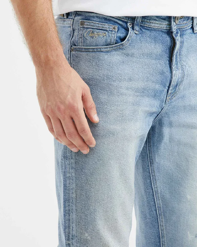 STRAIGHT FIT MID-RISE JEANS IN LIGHT WASH