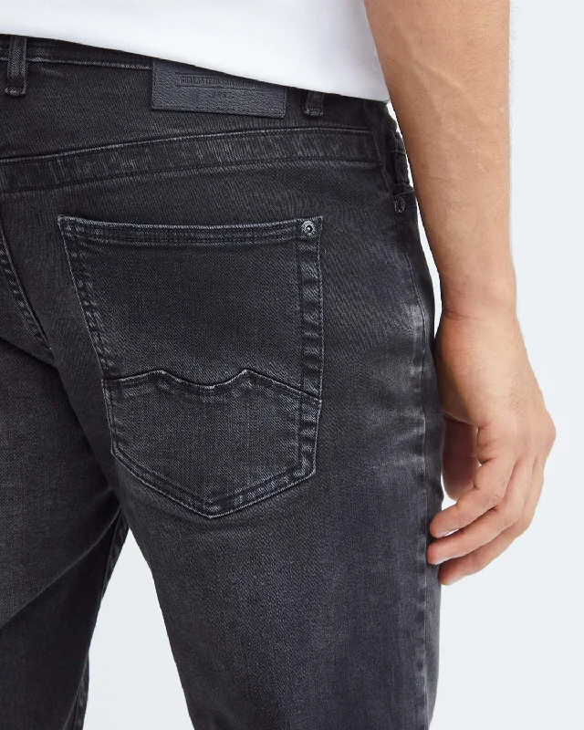 SLIM FIT MID-RISE JEANS IN BLACK