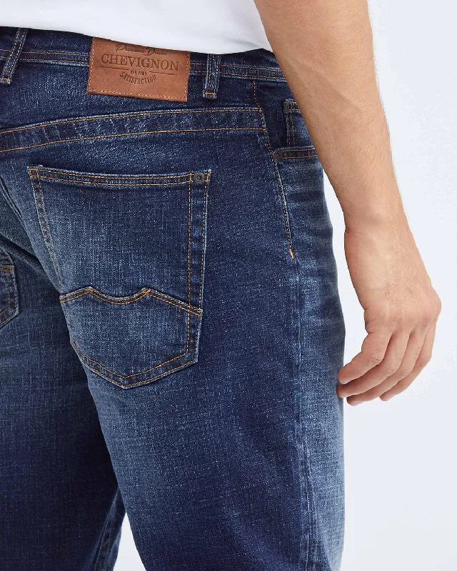 SLIM FIT MID-RISE JEANS IN DARK WASH