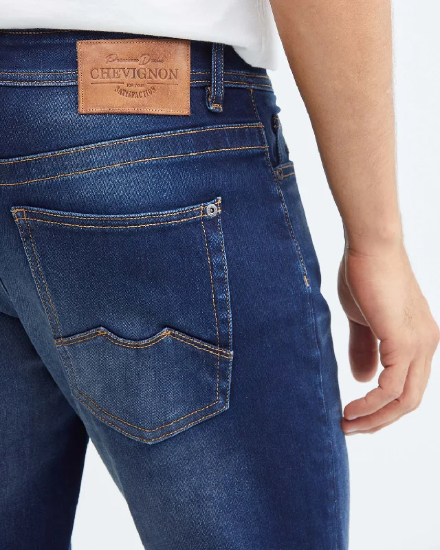 SLIM FIT MID-RISE JEANS IN DARK WASH