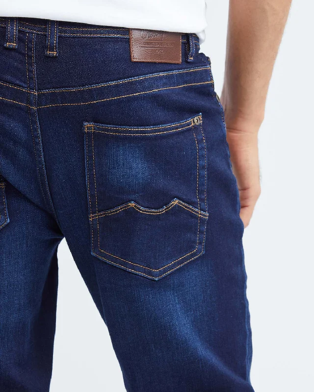 SLIM FIT MID-RISE JEANS IN DARK WASH