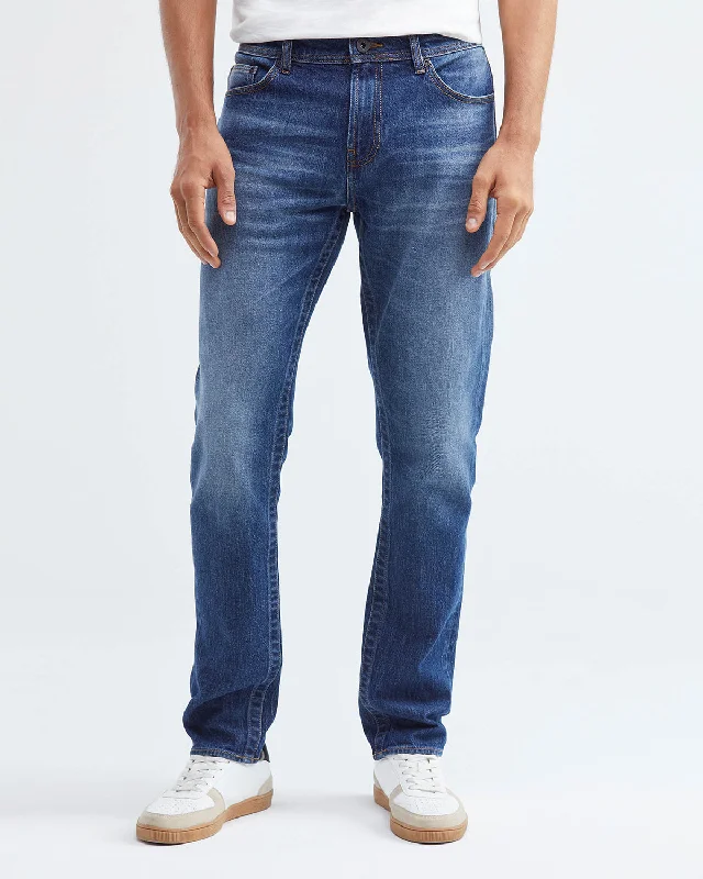 SLIM FIT MID-RISE JEANS IN MEDIUM WASH