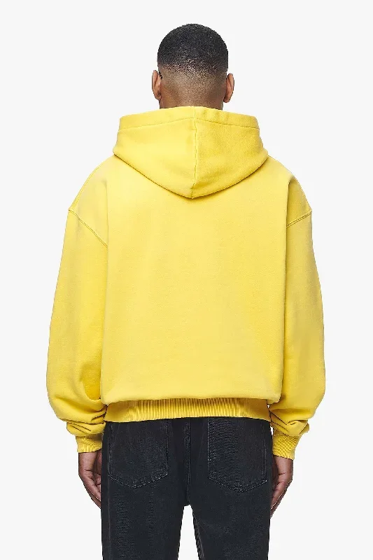 west-oversized-hoodie-vintage-washed-solar-yellow